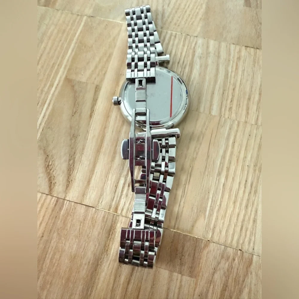 Aura ladies silver tone mother of pearl watch NEW BATTERY